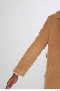 Kavan arm beige coat casual dressed upper body 0001.jpg